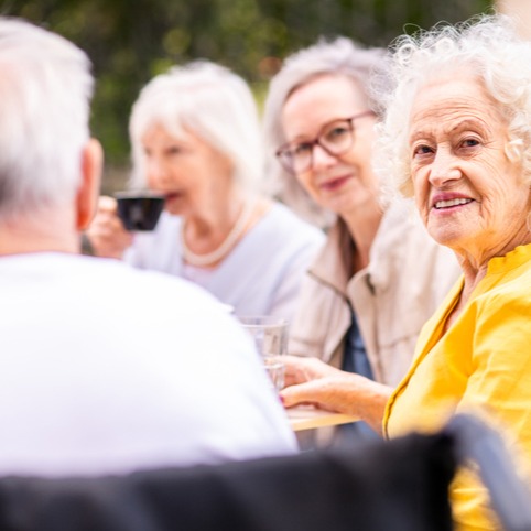 Seniors enjoy board games together