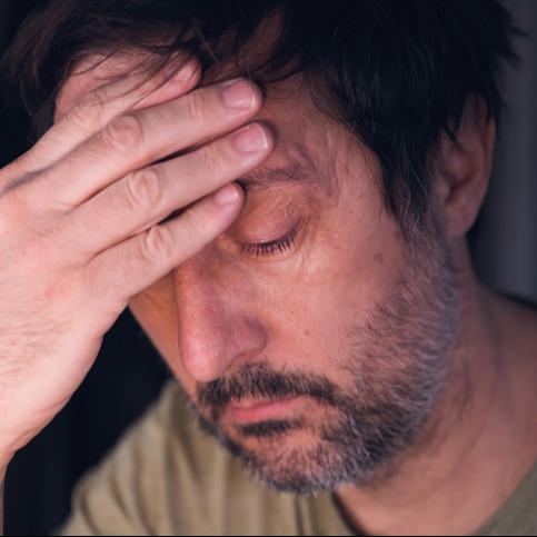 Man presents with nausea, drowsiness, looks tired, migraine medication side effects