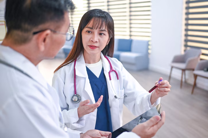 Doctors Analyzing Blood Sample for Elevated Eosinophils