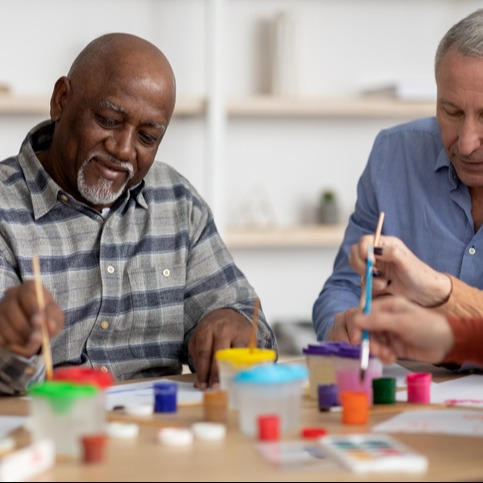 Senior Men Enjoying Watercolor Painting Together: A Creative Pursuit for Retirees