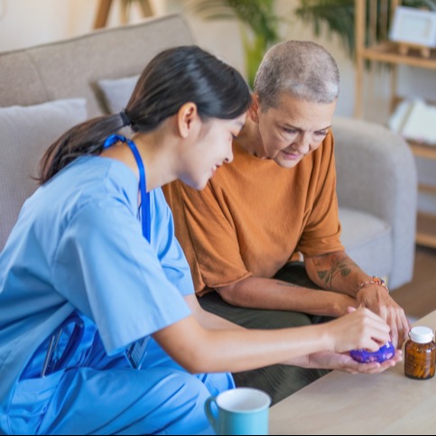 Nurse Advises Senior on Diabetes Medication