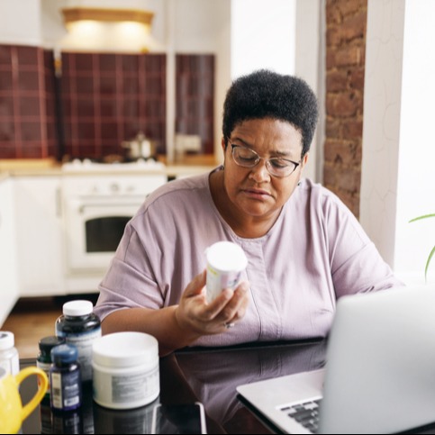 Senior Woman Managing Diabetes Costs with Online Medication Choices