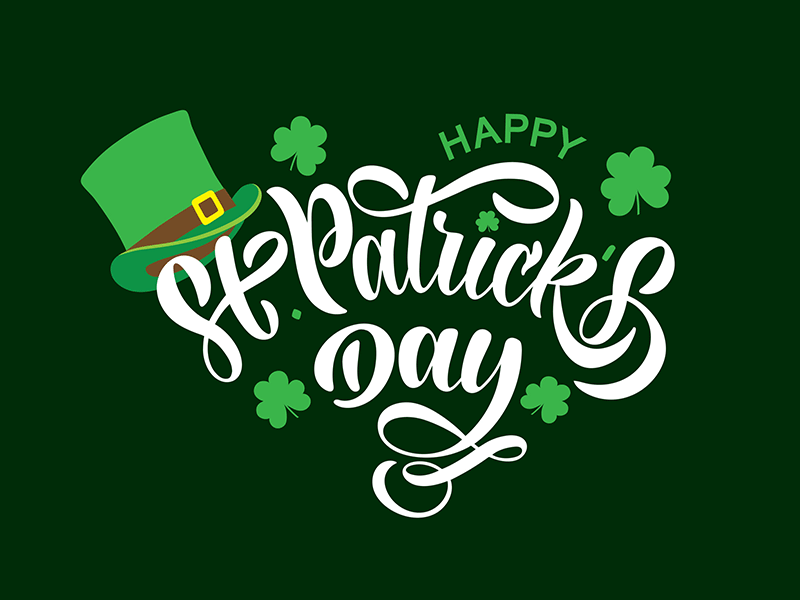 Green leprechaun's hat and shamrocks