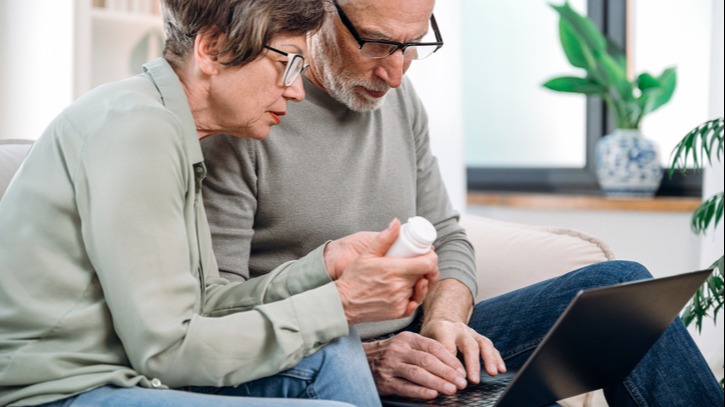 Elderly couple make online order and buy medication 
