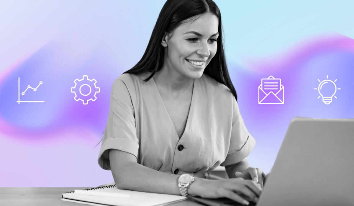A woman at her desk, engaged with her laptop, exemplifying a productive work atmosphere.