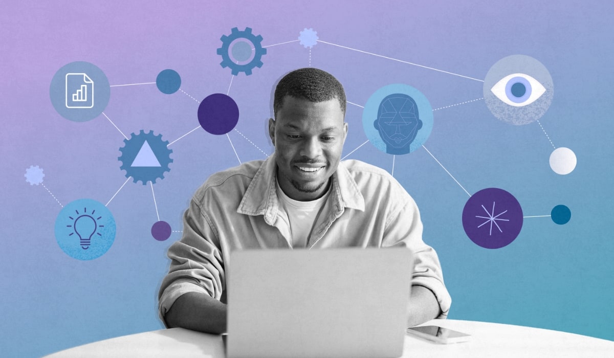 An employee at a laptop surrounding by icons representing the different types of skills: hard skills, soft skills, and technical skills.