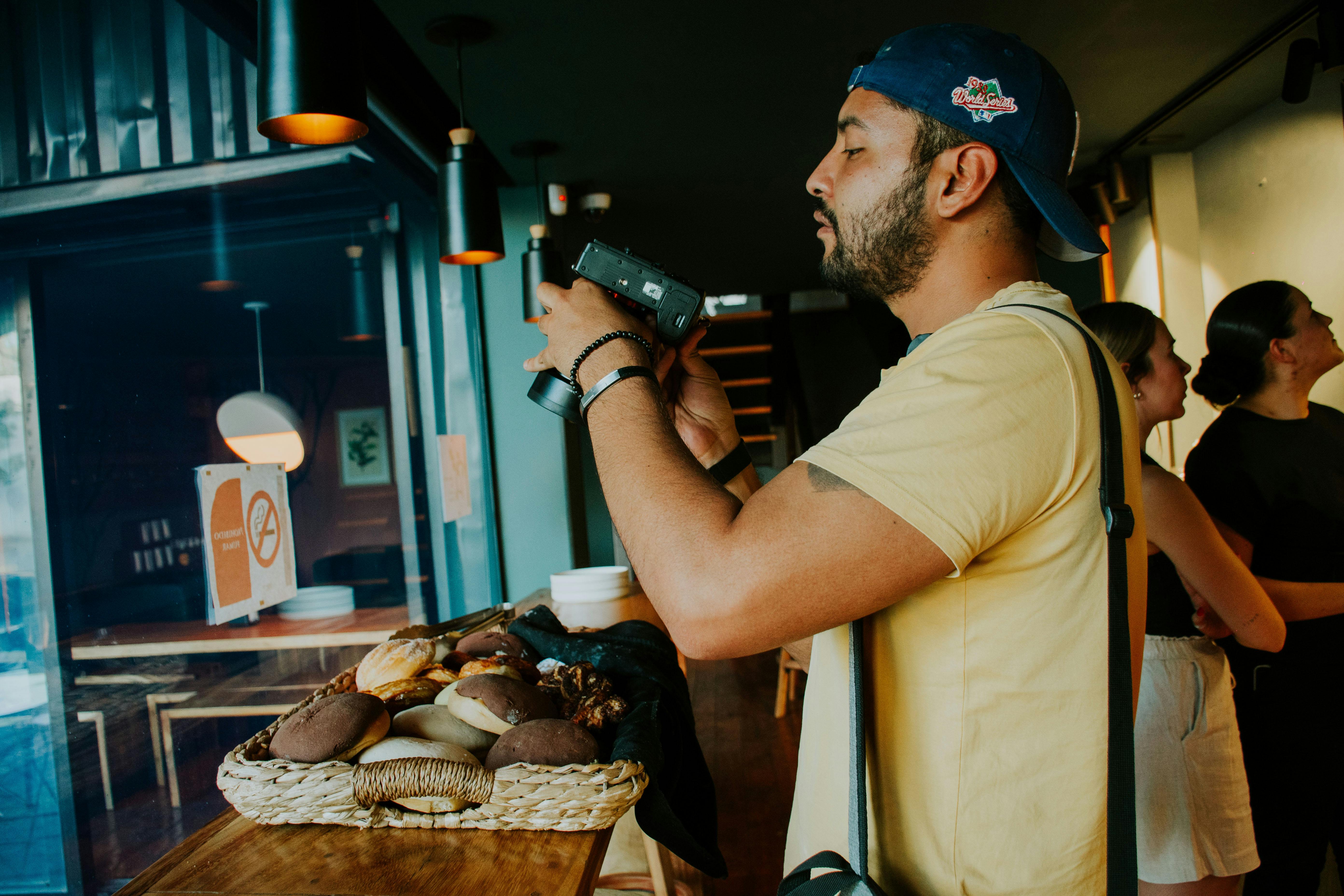 Photo by Amar  Preciado: https://www.pexels.com/photo/man-photographing-food-on-a-tray-in-a-bar-16467617/