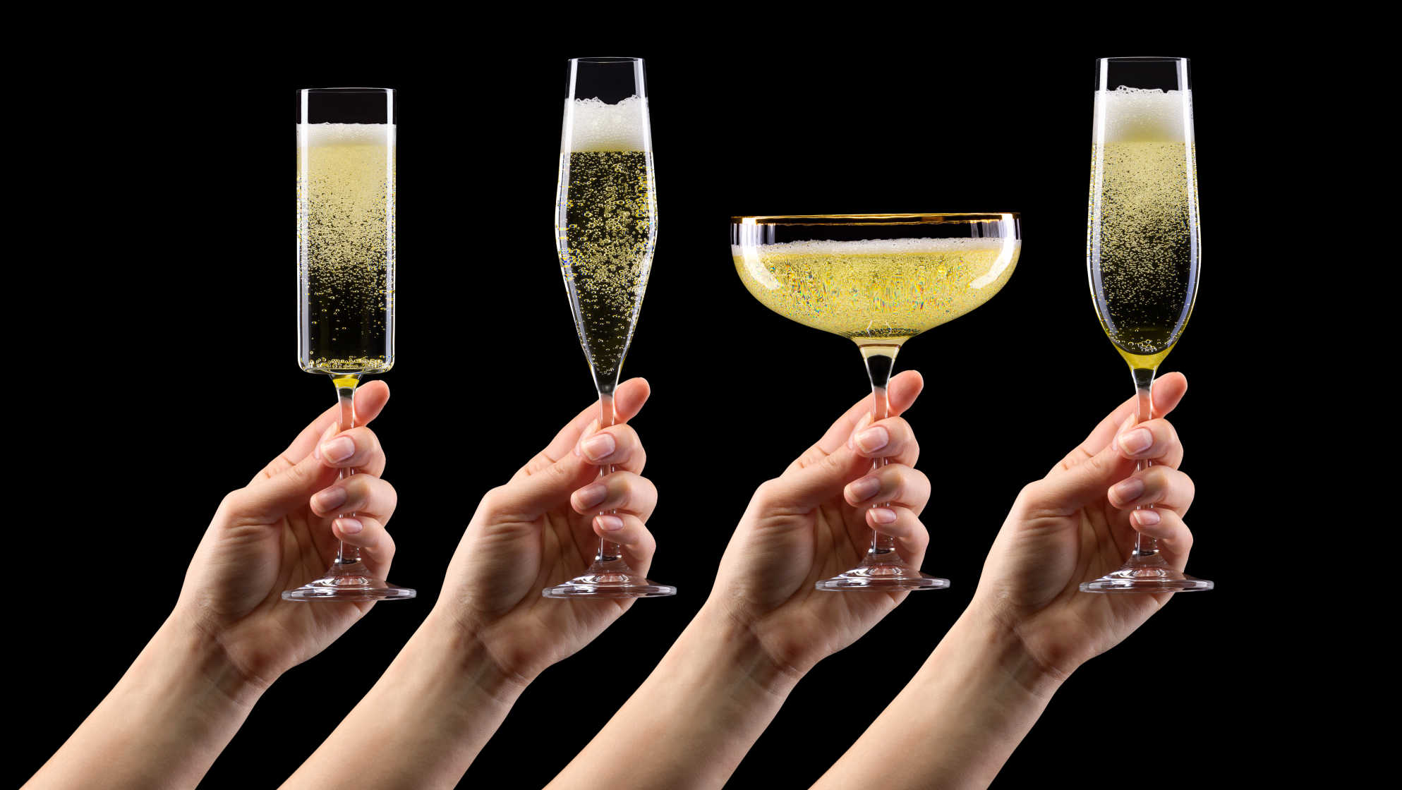 Holding different glasses of sparkling wine and champagne