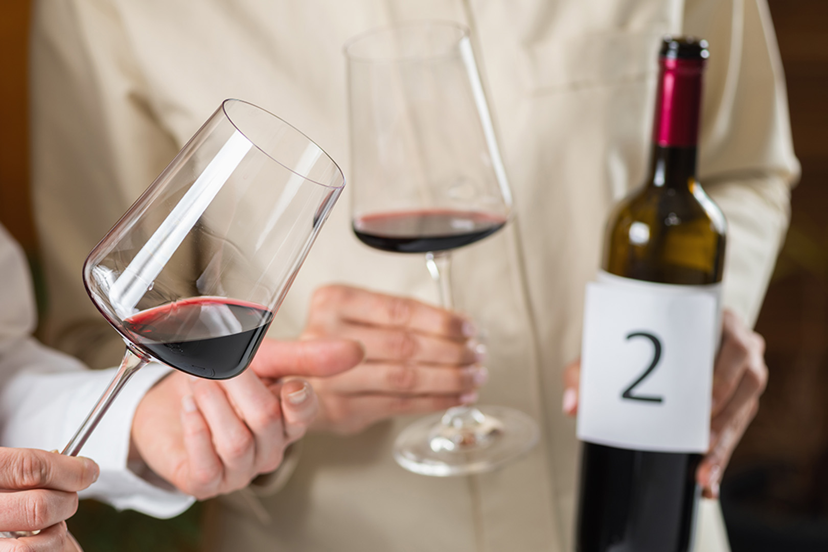 People participating in a blind wine tasting