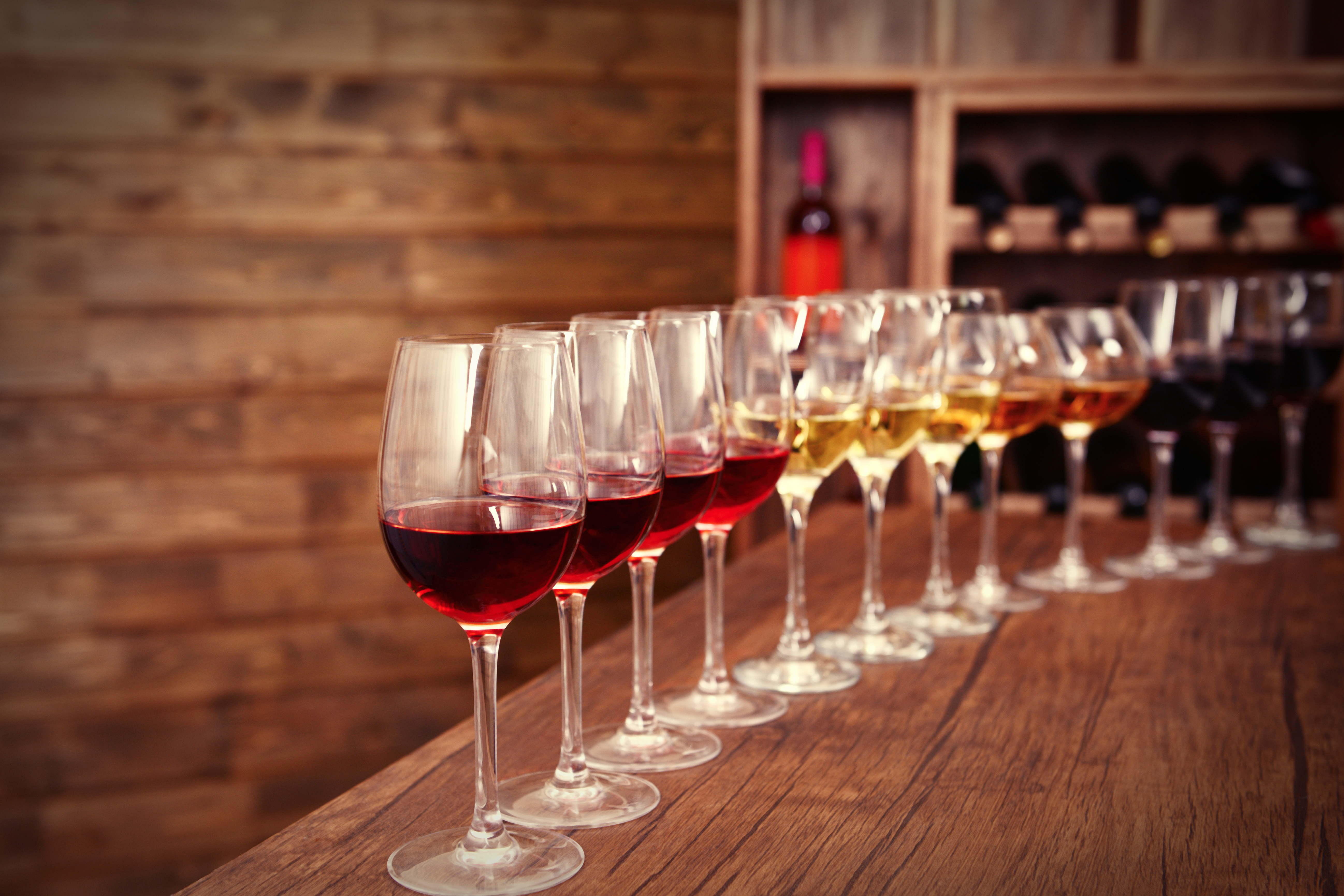 Wine glasses on wooden table