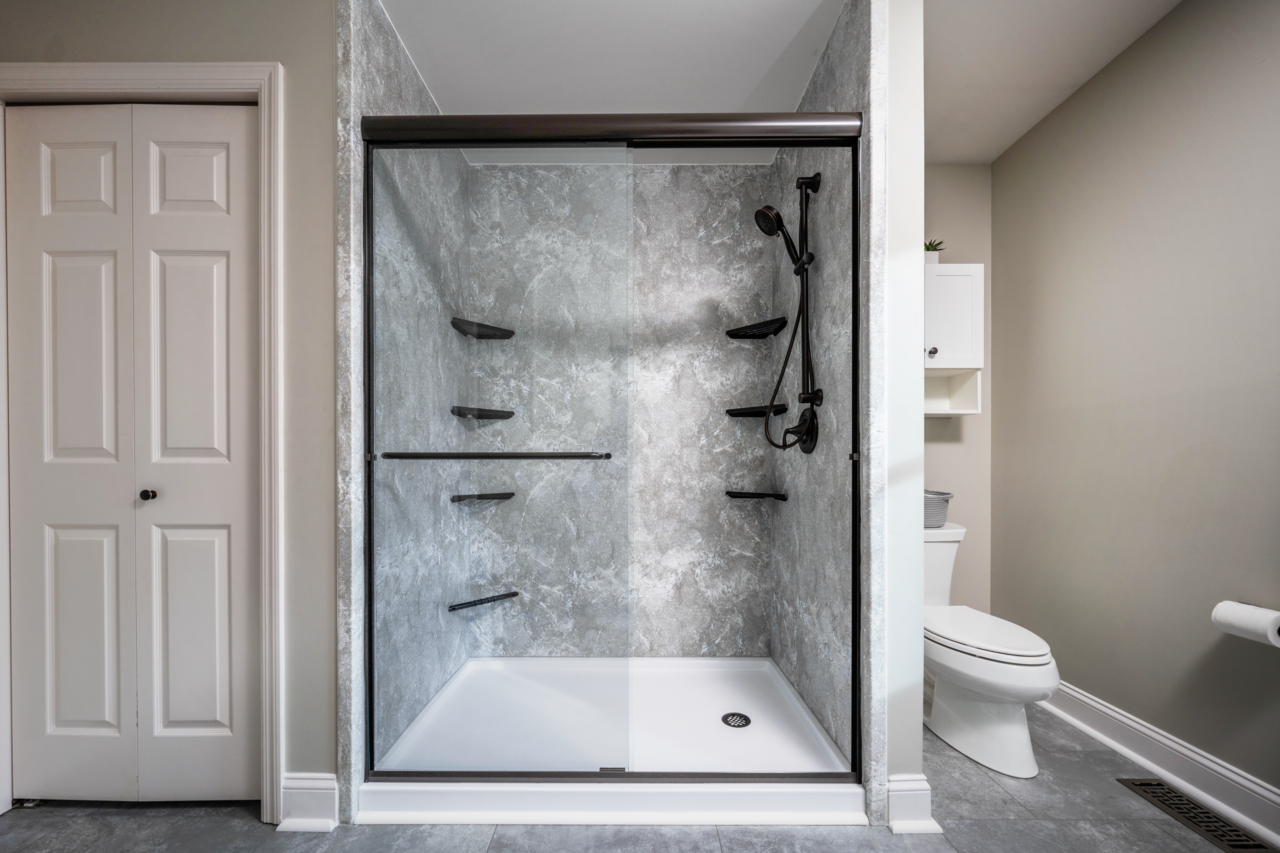 Walk-in shower with glass door installed in Boston bathroom