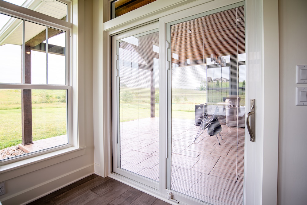 A sliding glass door leading out to a patio.
