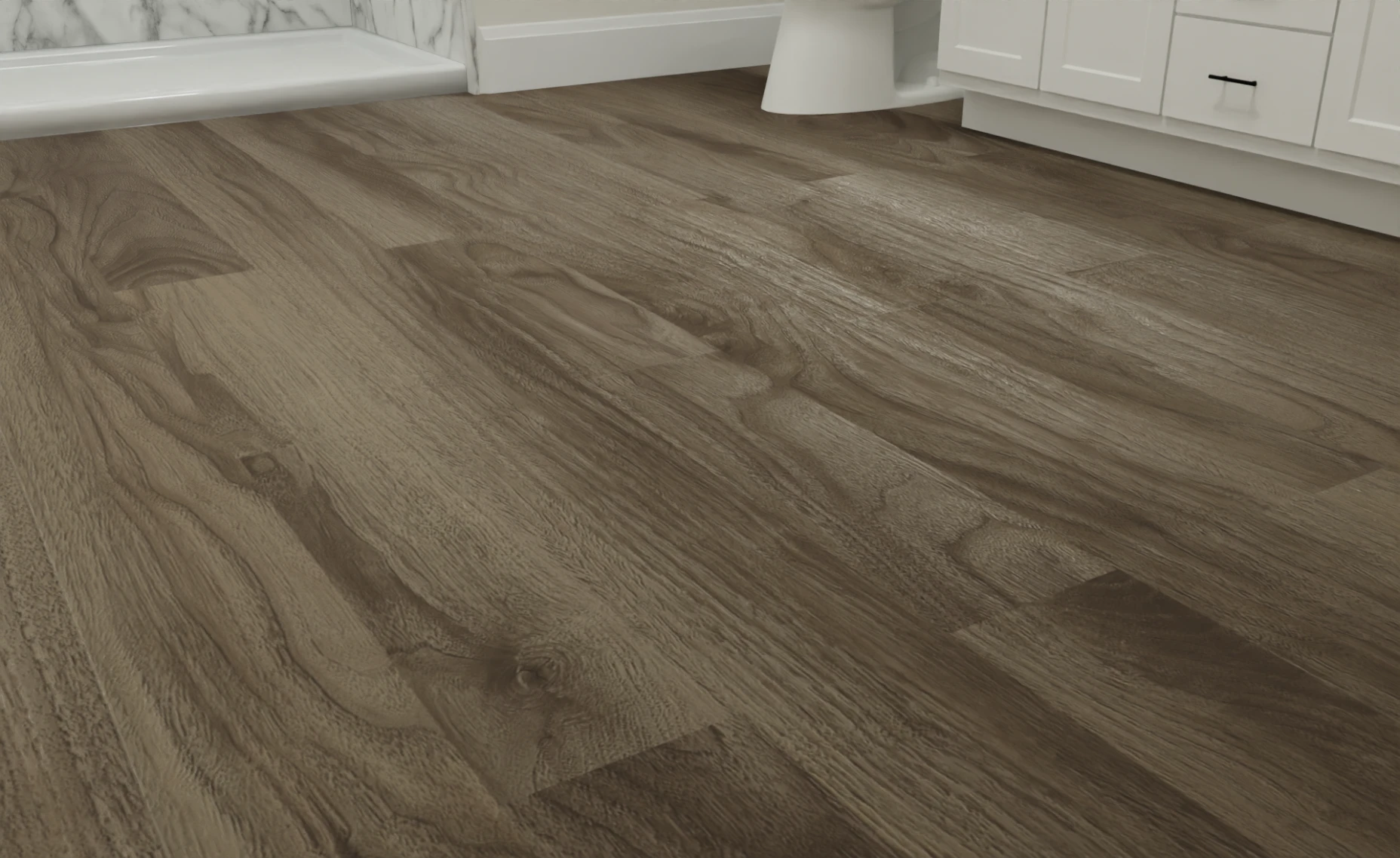 A close up shot of luxury vinyl plank flooring in a bathroom.