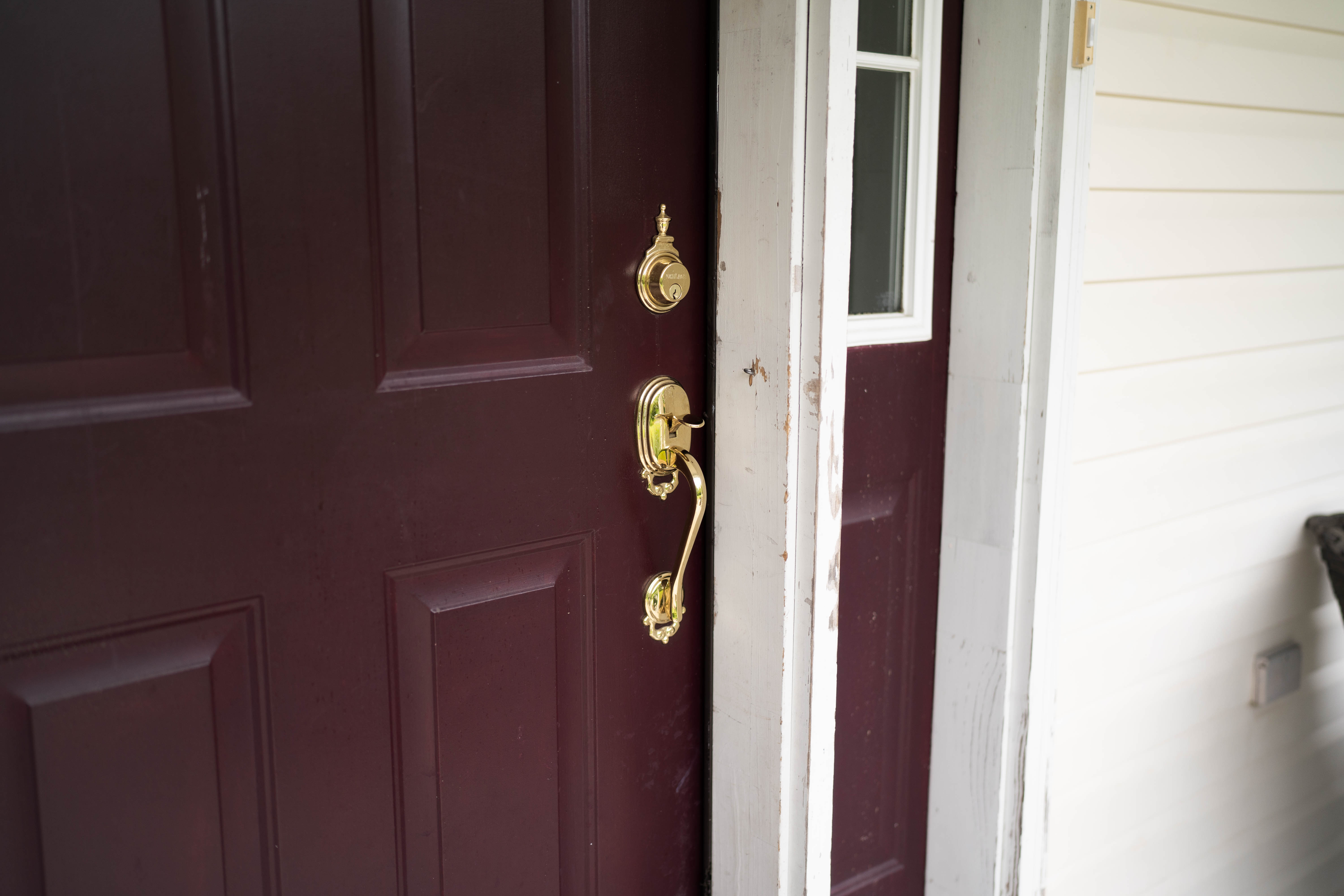 Old entry door before replacement