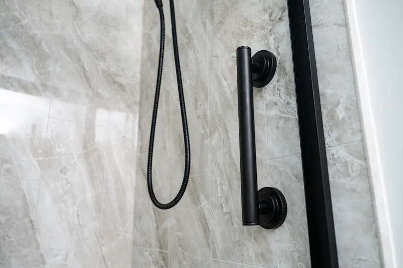 Custom Silken Glacier Nexa walk-in shower installation in a light bathroom