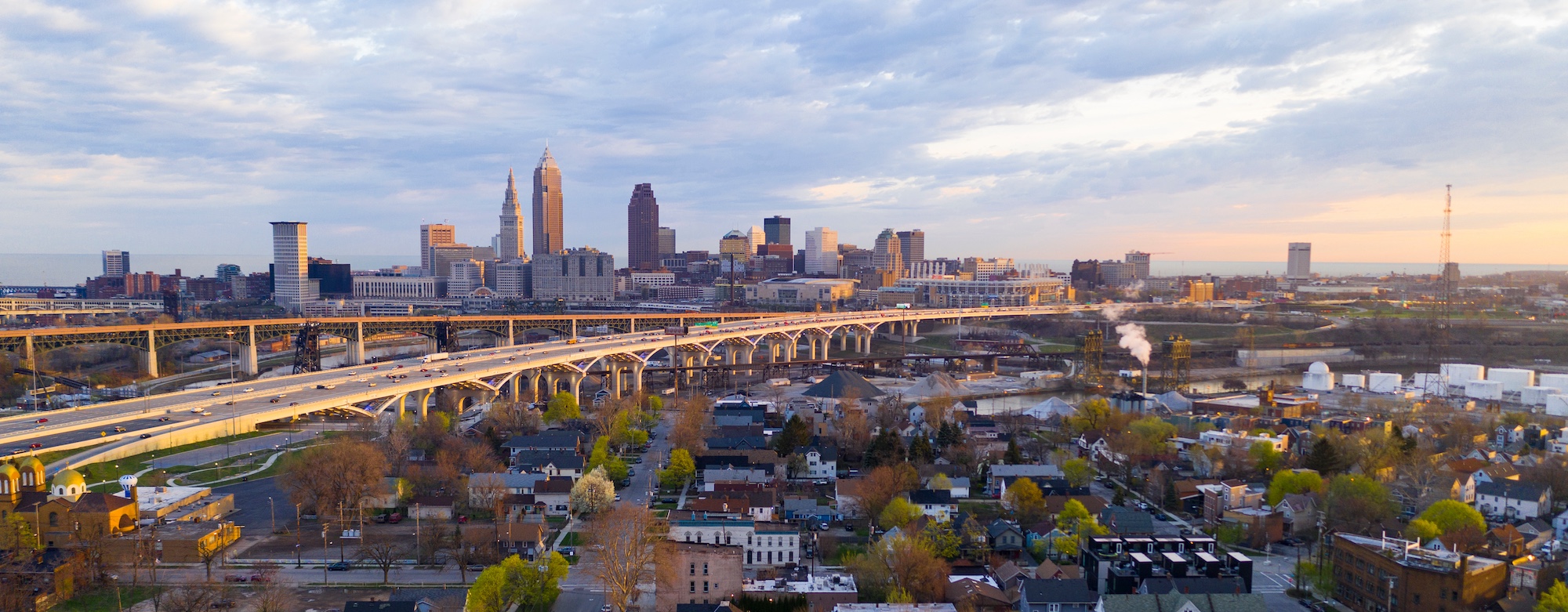 A view of the Cleveland suburbs with the city's skyline in the distance.
