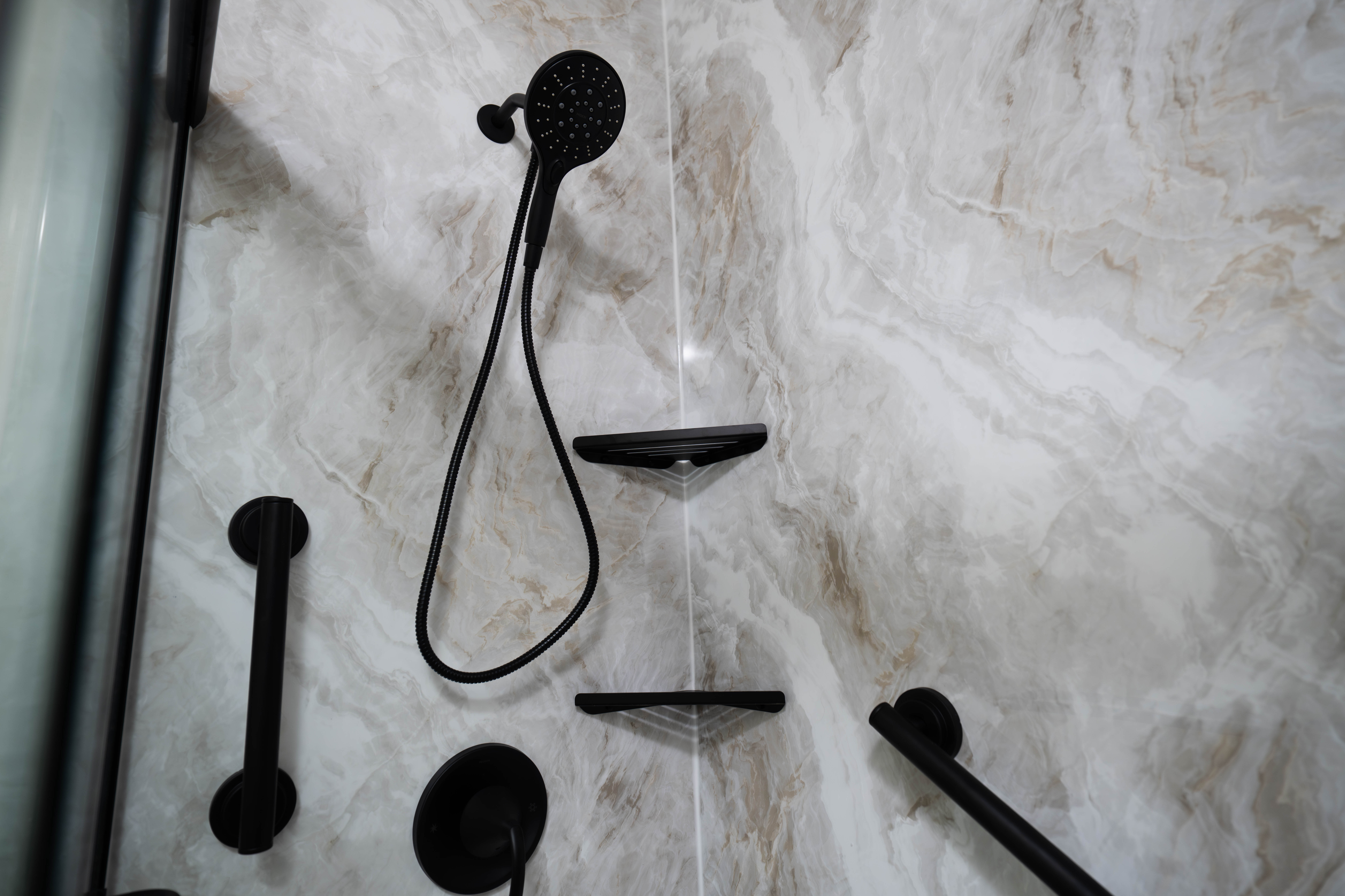 Walk-in shower with modern wall surround in Boston bathroom