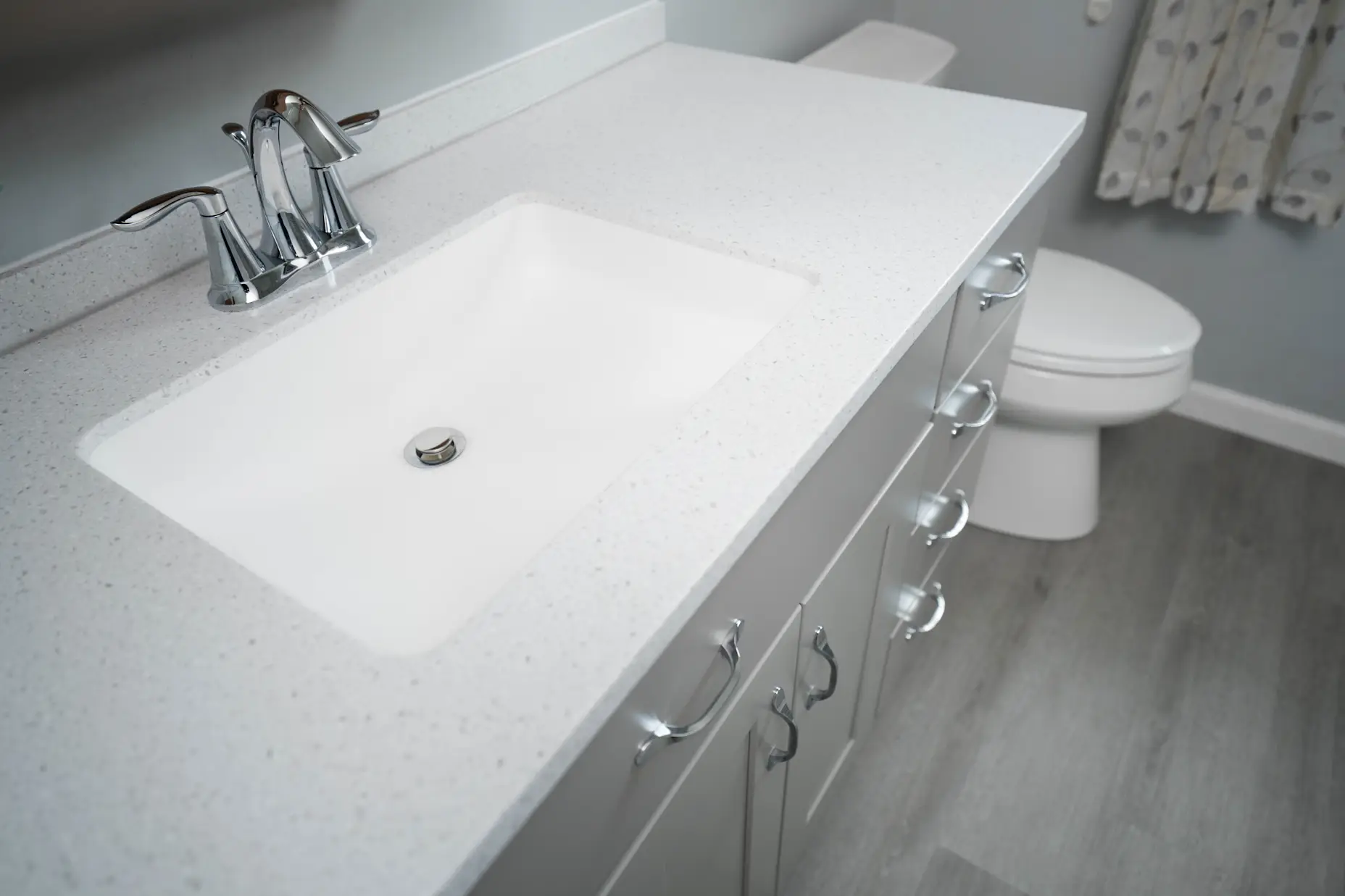 Glacier Marble and Pewter Vanity in a West Shore Home full bathroom remodel.