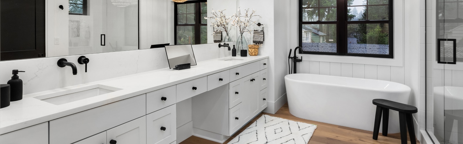 An all-white modern bathroom.