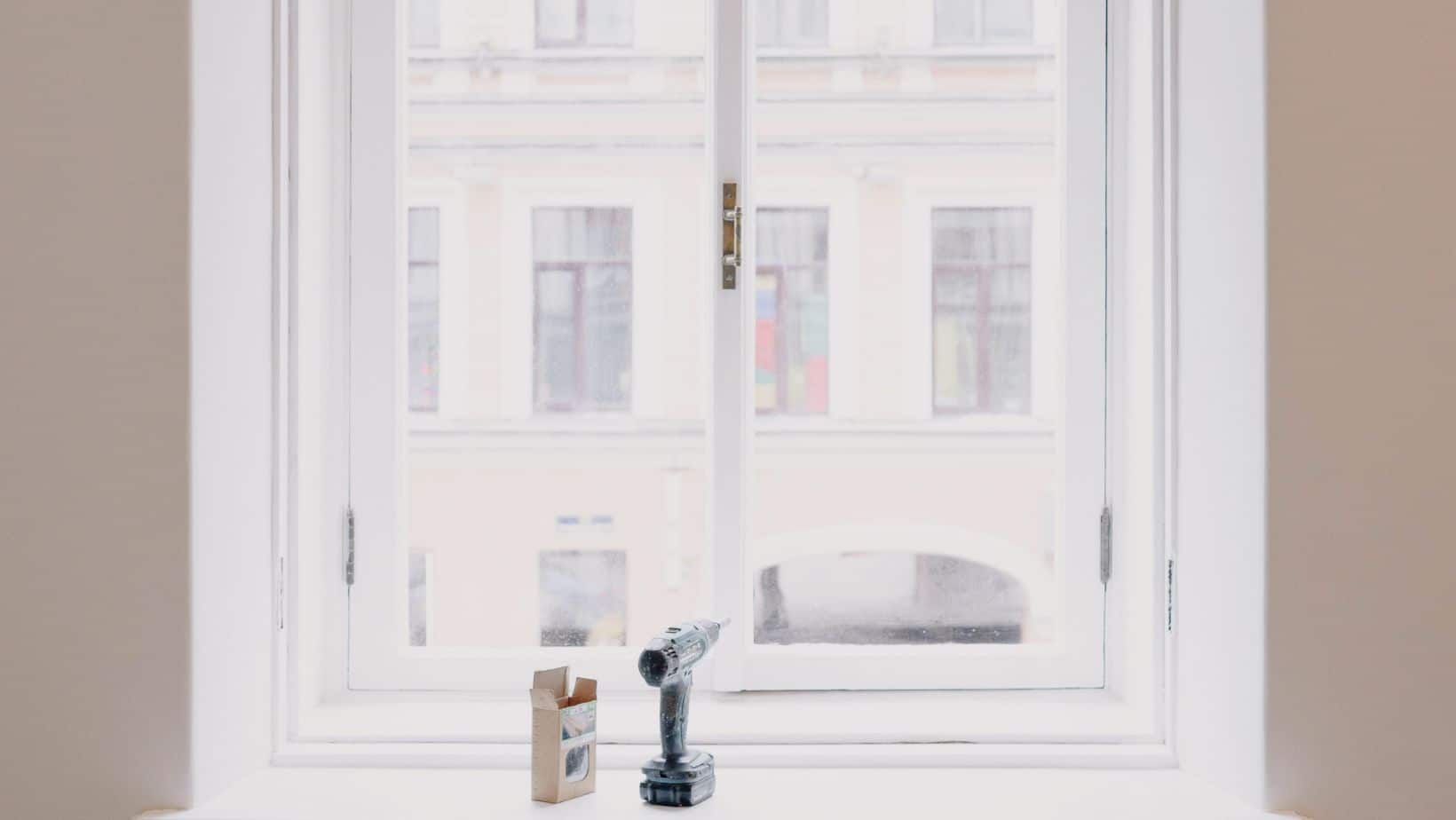 A double hung window seen from the interior of a home.