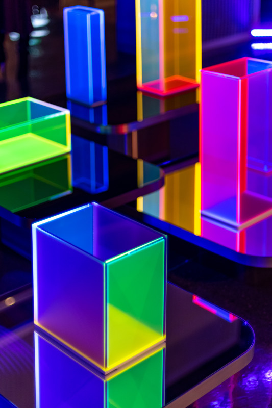 series of glowing colored acrylic towers