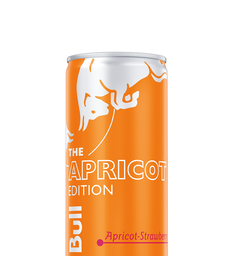 A half can of Red Bull Apricot Edition