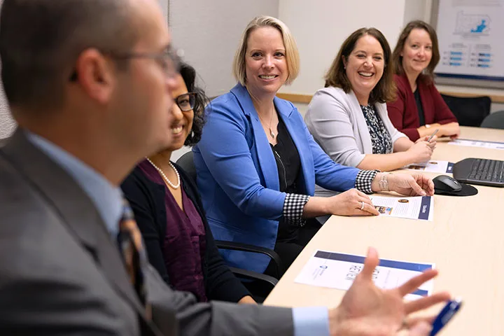 researcher workgroup in conference room