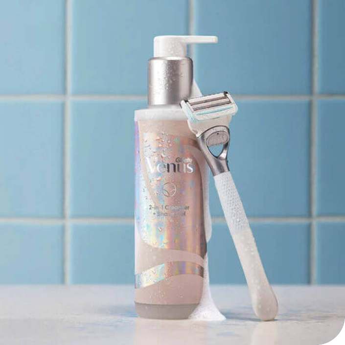 2-in-1 Cleanser & Shave Gel with the pubic razor, in the bathroom