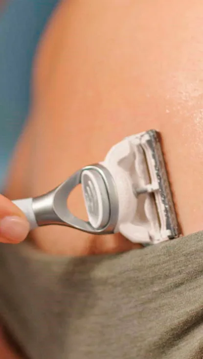 Women shaving her belly with Pubic Hair Skin Razor