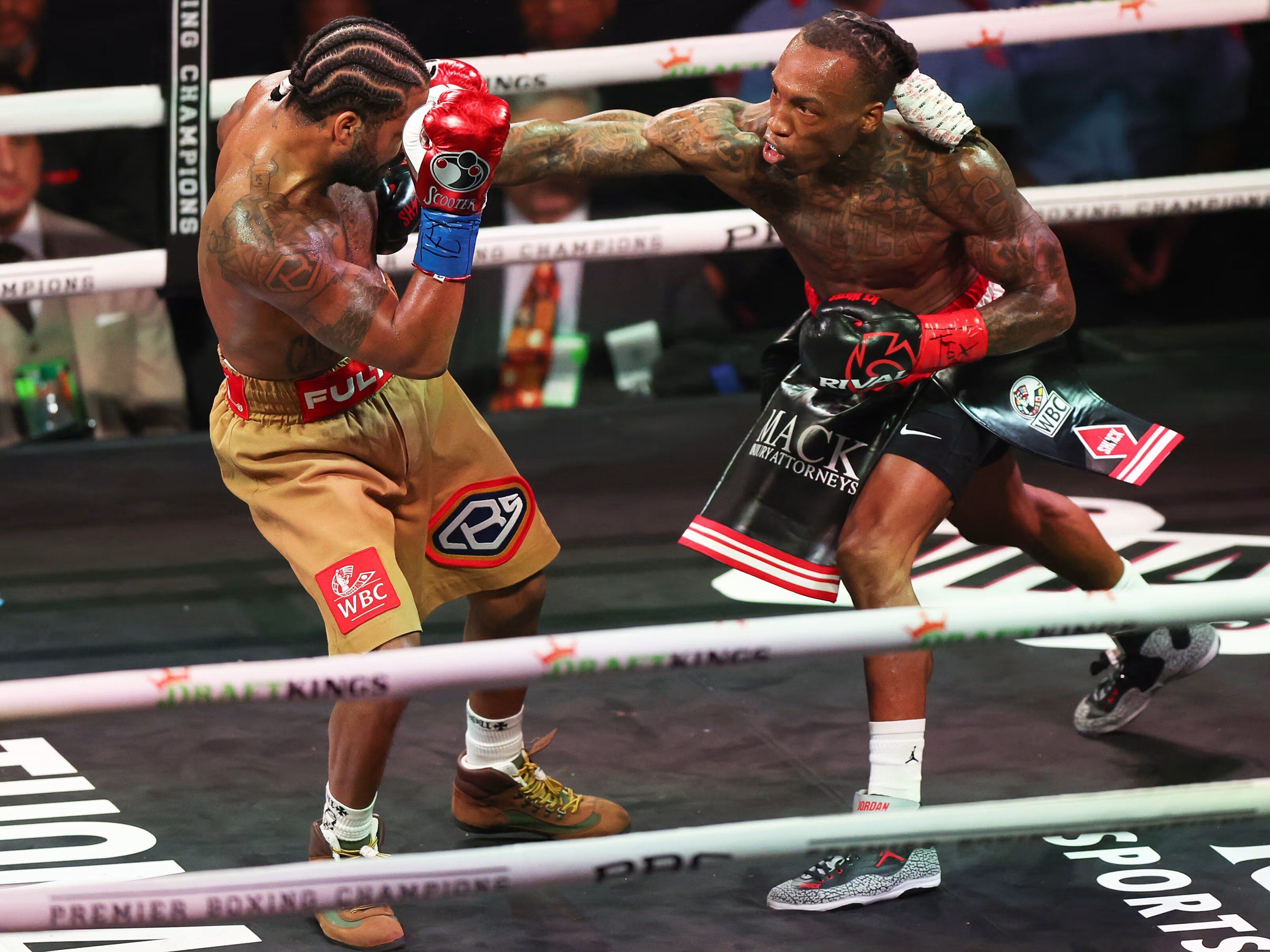O'Shaquie Foster lands a punch against Stephen Fulton in a December 2025 bout, an illustrative example of his counterpunching