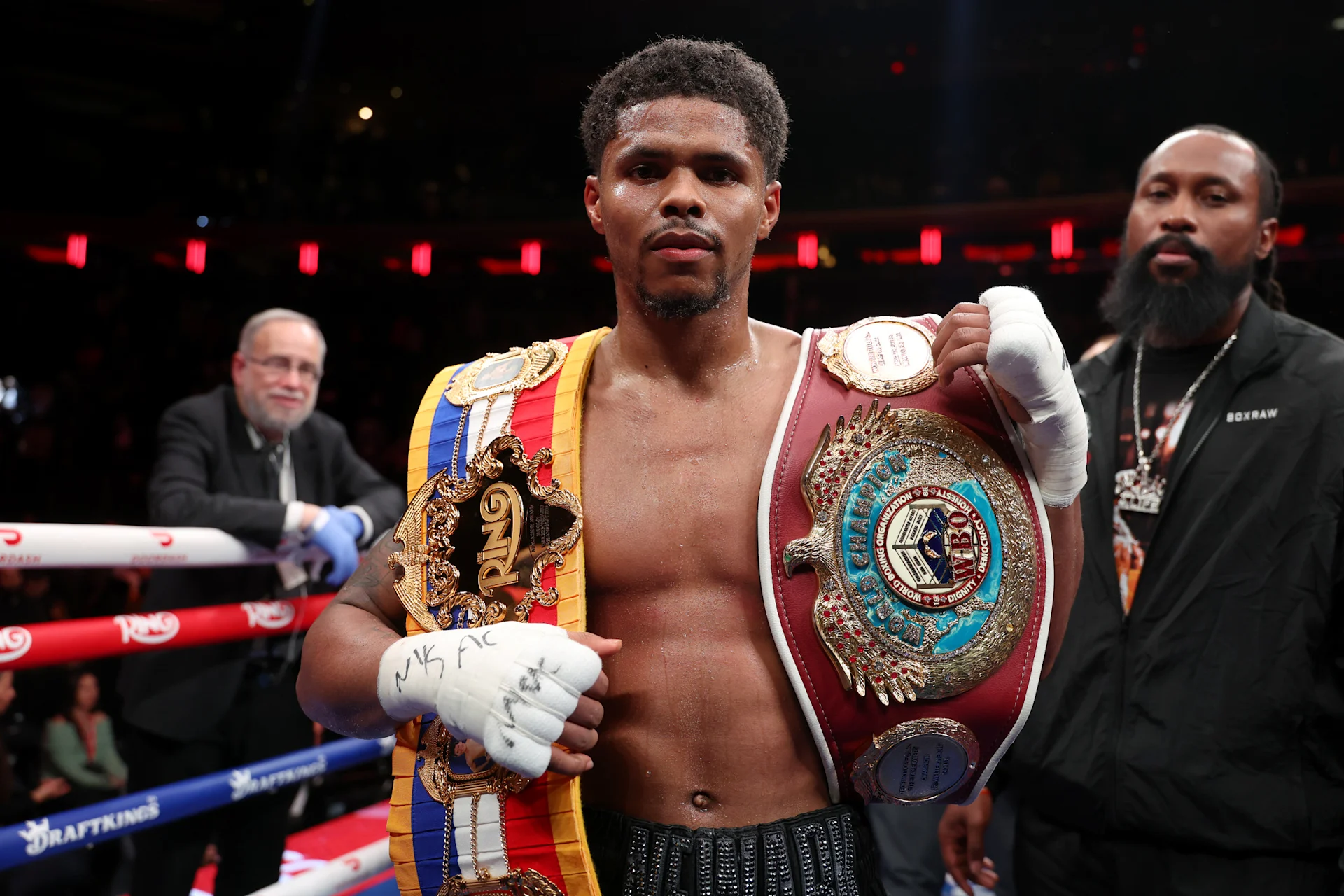 Shakur Stevenson displays his championship belts in 2026; a potential future opponent for Foster