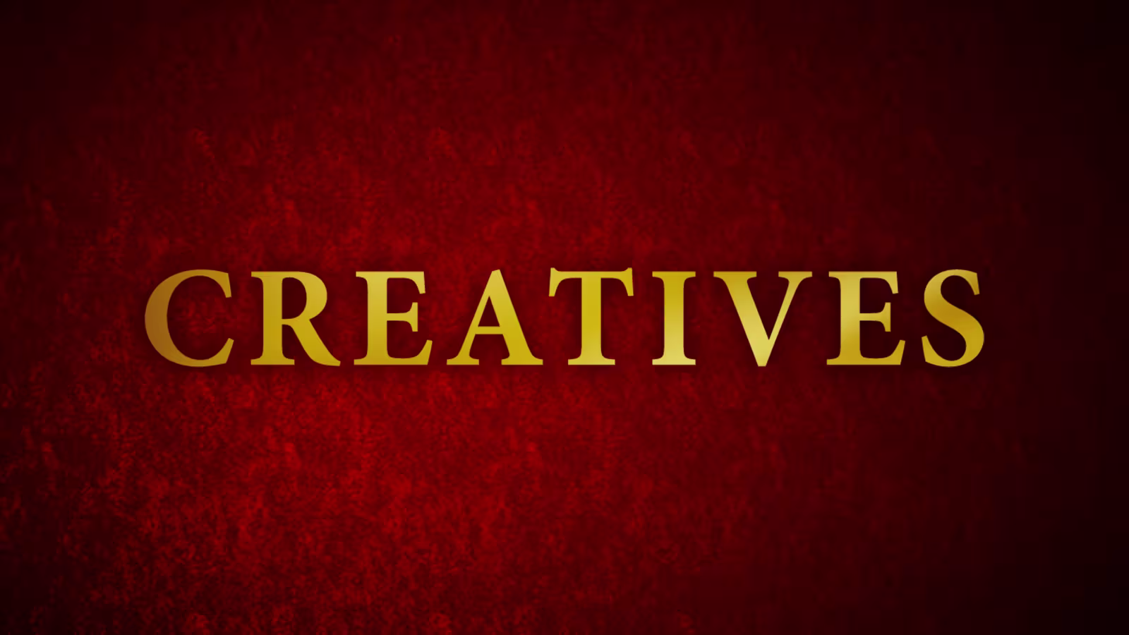 Goldener Schriftzug Creatives auf roten Grund