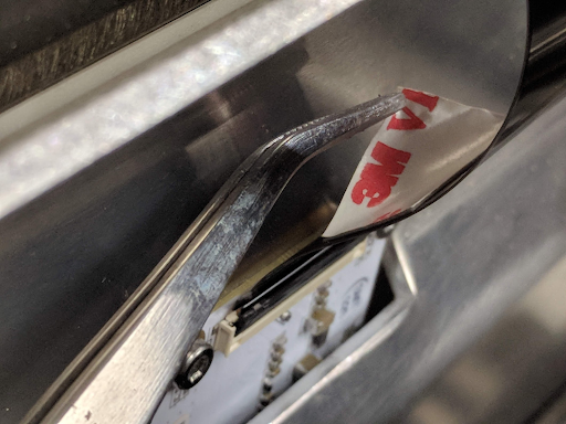 Remove Small Adhesive Strip