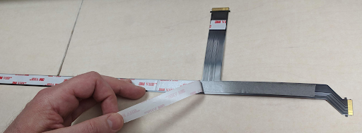 Remove the Long Strip of Adhesive Backing