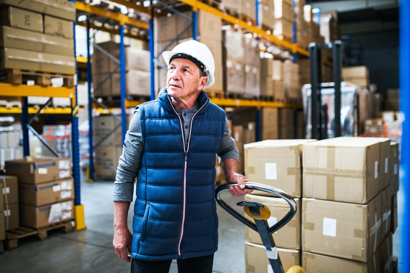 Man pulling a pallet truck