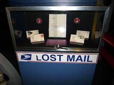 USPS glass case containing lost mail