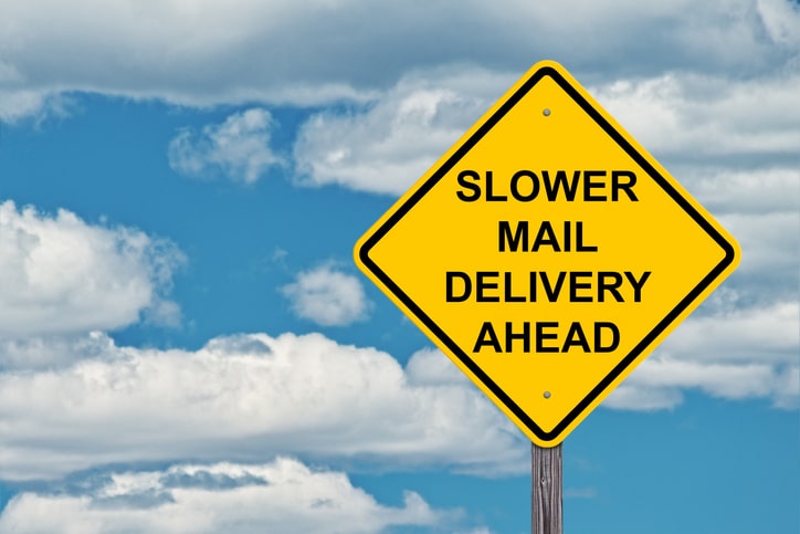 slower mail delivery ahead sign