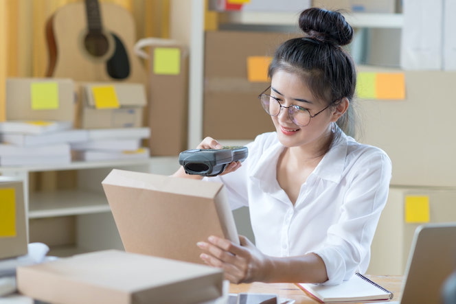 Woman scanning package