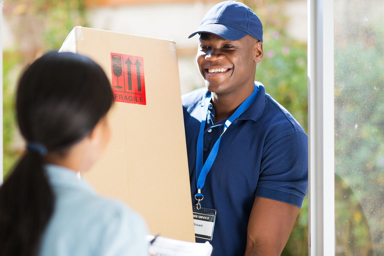 Delivery person delivering a package