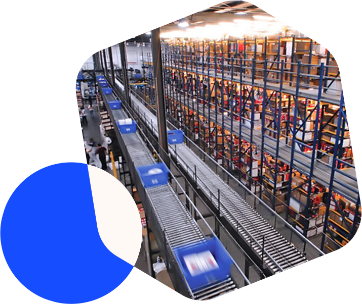 Warehouse with boxes moving along conveyor belt
