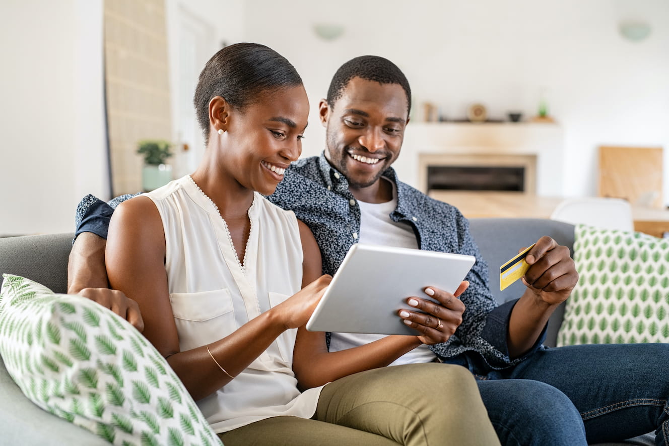 a couple sitting on the couch