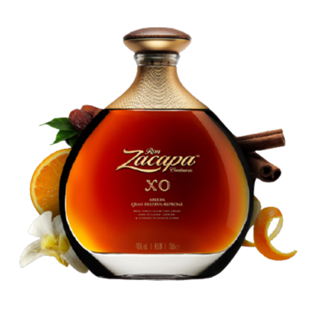 A bottle of Ron Zacapa XO rum is centered against a dark background.