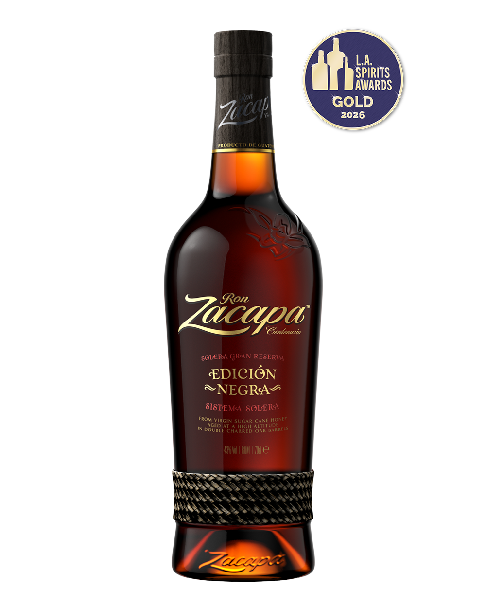 A bottle of Ron Zacapa Edición Negra rum is centered against a dark background.