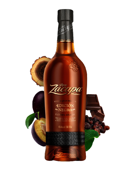 A bottle of Ron Zacapa Edición Negra rum is centered against a dark background.