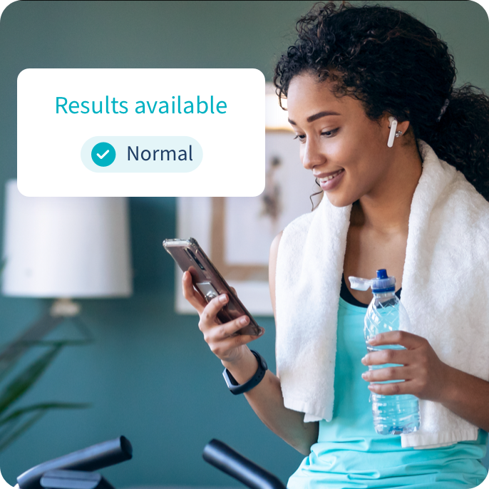 Micronutrient results screen with woman on phone