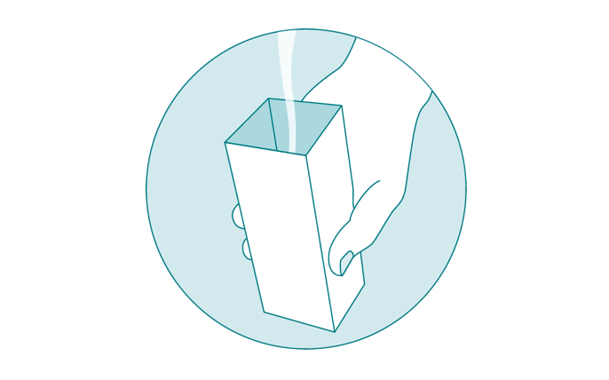 Urine flowing into urine collection cup. Urine flowing into urine collection cup.
