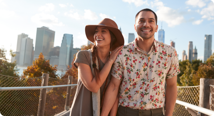 Man and woman walking holding hands