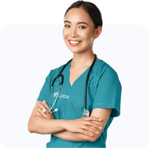 Female healthcare professional smiling with stethoscope.