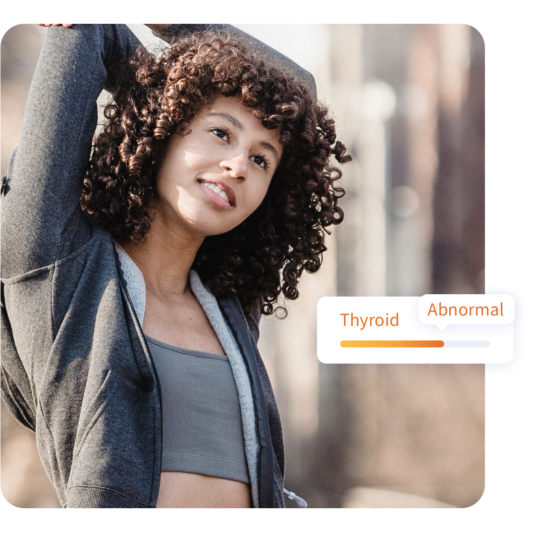 woman doing yoga with abnormal thyroid results