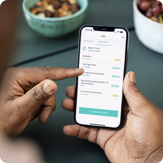  Letsgetchecked male customer using the LetsGetChecked app to view his health test results. 